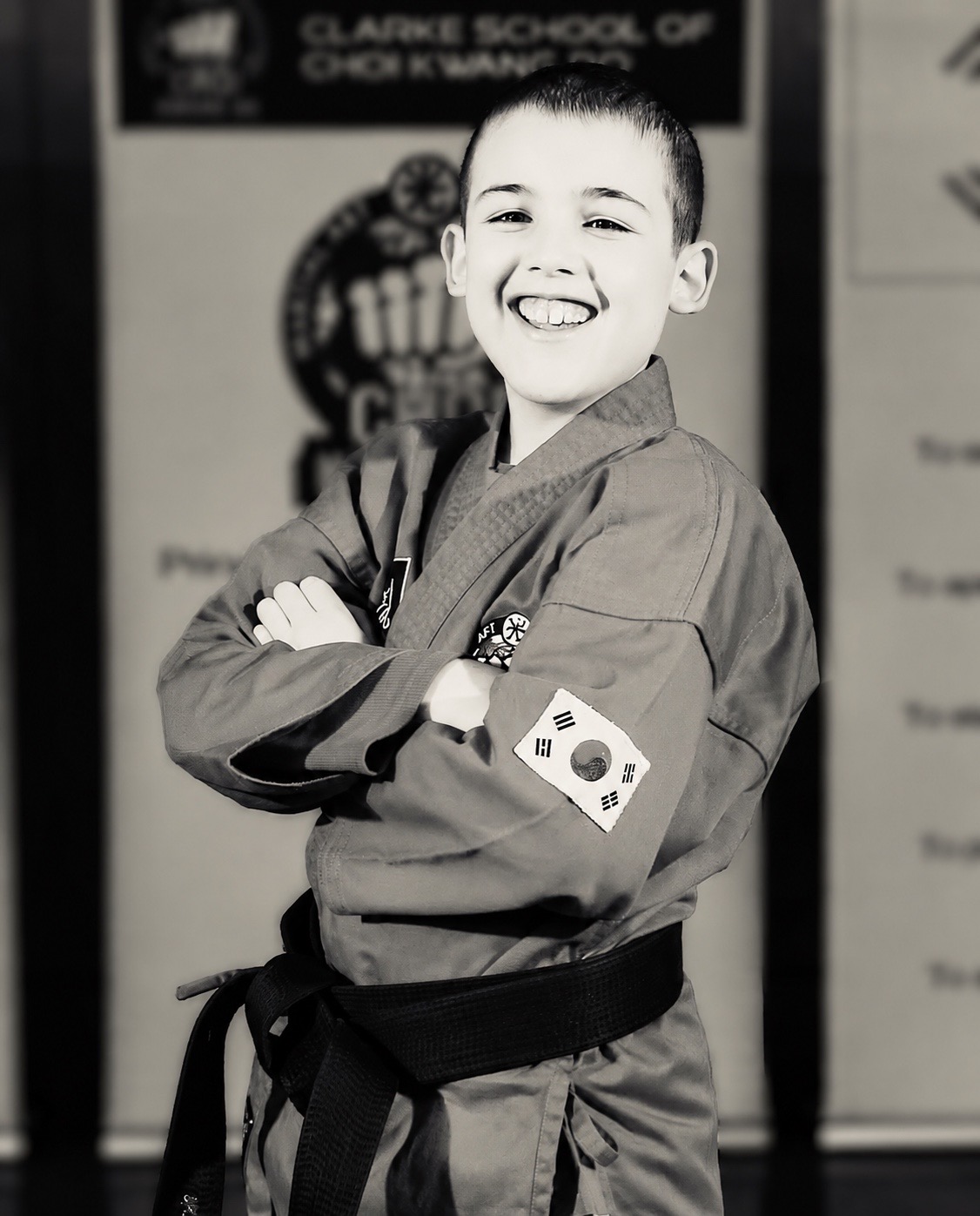 Children practising martial arts in a clean dojo